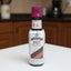 Bottle of Angostura Cocoa Bitters on a dark surface
