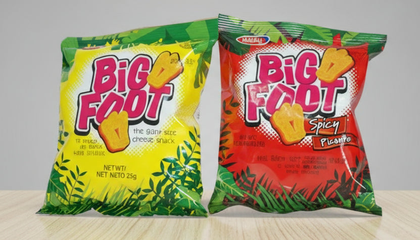 Two packages of BIG FOOT cheese snack, one green and one red, both with the BIG FOOT logo and images of cheese puffs.