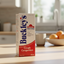 Buckley's Original Cough Syrup Mix, 100 mL packaging, with branding and product information.