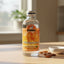 Bottle of Benjamins Almond Flavoring with orange label