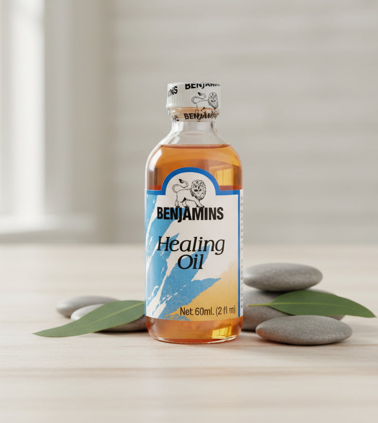 Bottle of Big John's Healing Oil on a white background