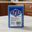 Packaged laundry soap with Bomber branding on a white background