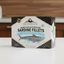 Package of Brunswick boneless butterflied sardine fillets on a white background