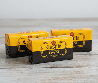 Bar of Castile soap with olive oil on a white background
