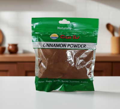 Green package of Cariil cinnamon powder with visible brand name.