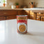 Can of Caribbean Gold Medal coconut milk on a dark surface