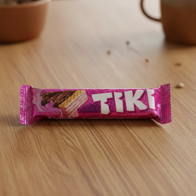 Pink TIKI candy bar packaging on a white background
