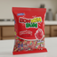 Red package of Bon Bon Bum strawberry candy with Colombina logo