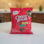 Red package of Choco Break Bonbon Bum held in front of a store shelf.