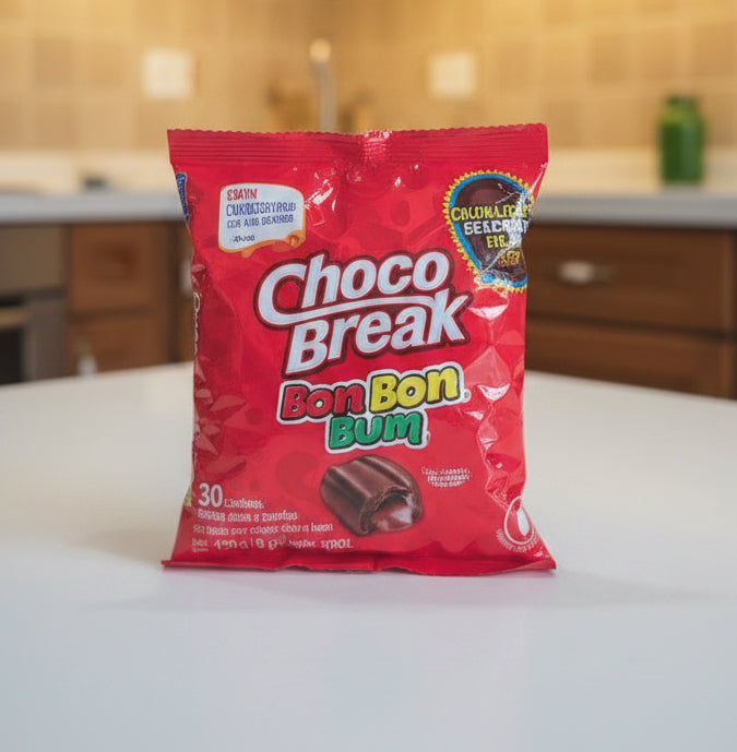 Red package of Choco Break Bonbon Bum held in front of a store shelf.