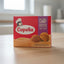 Box of Copelia milk caramel candy conchitas with a red and purple design.