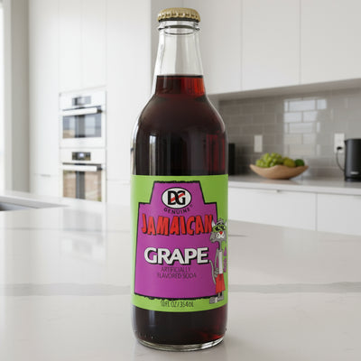 Bottle of Jamaican Grape soda with a colorful label on a white background