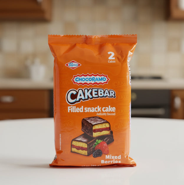 Orange package of Chocoramo Cakebar with a picture of a cake and berries on a white background