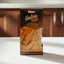 Packaging of Paraguáutis Galleta Rellena with a wooden surface background