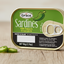 A can of Grace Sardines with Peppers in vegetable oil, with branding and nutritional information visible.