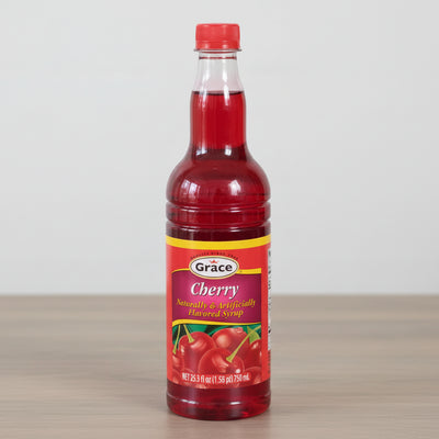 Bottle of Grace Cherry syrup on a white background