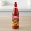 Bottle of Grace Hot Pepper Sauce on a white background