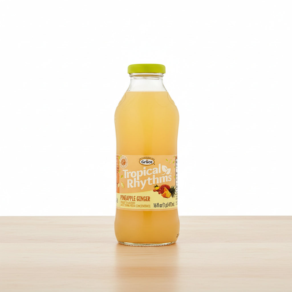 Bottle of Tropical Rhythms Pineapple Ginger juice with a yellow label on a white background