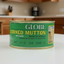 Can of Globe Corned Mutton with Quince Supermarket logo on a white background
