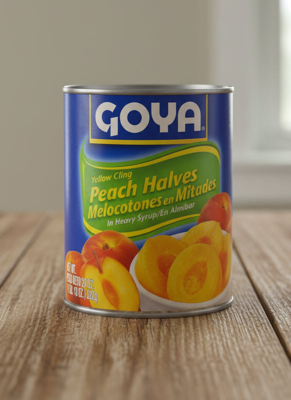Goya brand can of yellow cling peach halves with blue label