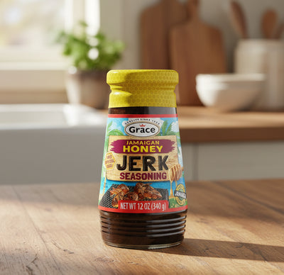 Jamaican Honey Jerk Seasoning bottle with yellow cap on a white background