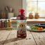 Bottle of Grace Jamaican Style Jerk BBQ Sauce on a white background