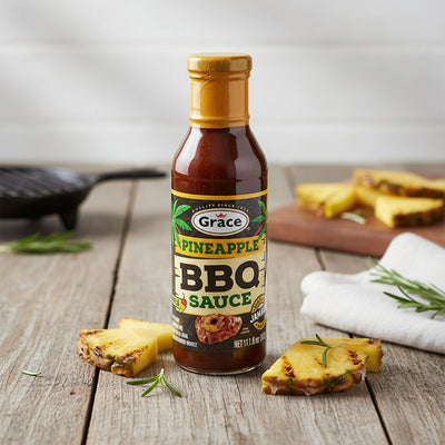 Bottle of Grace Pineapple BBQ Sauce on a white background