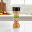 Bottle of Grace Caribbean Traditions Chicken Seasoning on a white background