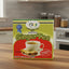 Packaging for JCS Instant Ginger Tea featuring a cup of ginger tea and a bundle of ginger roots, with branding and product information.