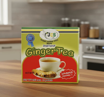 Packaging for JCS Instant Ginger Tea featuring a cup of ginger tea and a bundle of ginger roots, with branding and product information.