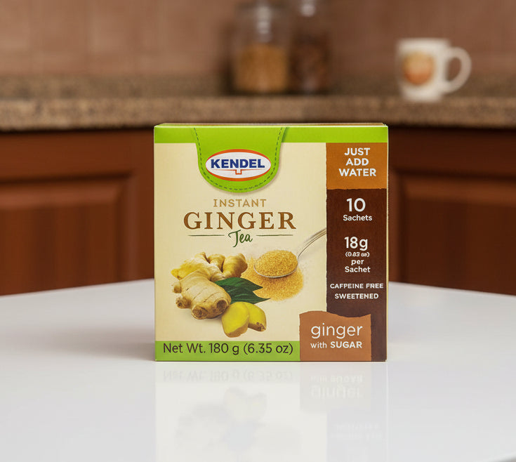 Kendel Instant Ginger Tea package with ginger root and sugar on a beige background