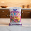 Bag of 'Garamelos Sortidos' candy with colorful text on a white background