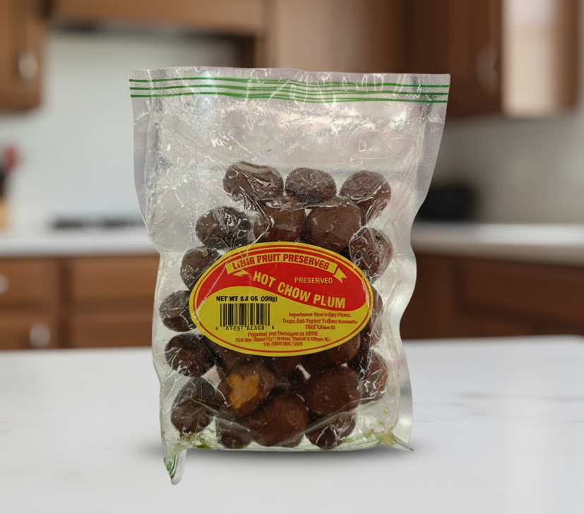 Bag of preserved hot chow plums with a visible label and Quince Supermarket branding.