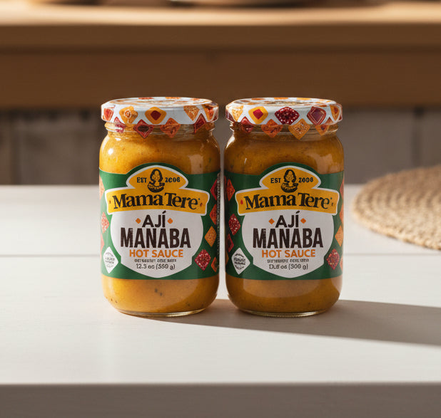Two jars of Mama Tere Aji Manaba hot sauce on a store shelf with a price tag.
