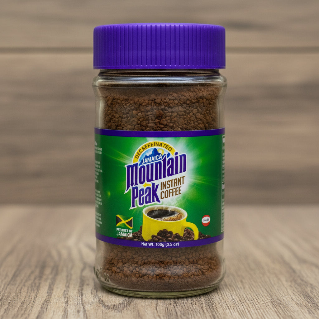 Jamaican Mountain Peak Instant Coffee jar with purple lid on a white background