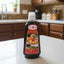 Bottle of Perú Chef Chancaca syrup on a shelf with price tag.