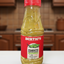 Bottle of Bertie's Pimento Pepper Sauce with a red label on a white background