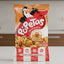 Packaged snack with a penguin character and 'Po Petas' branding on an orange and red background.