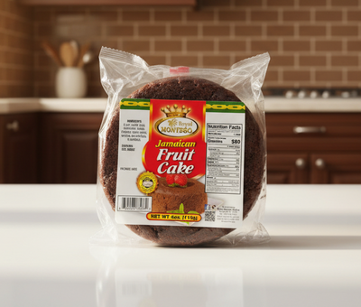 Packaged Jamaican fruit cake with Montego label on a clear background