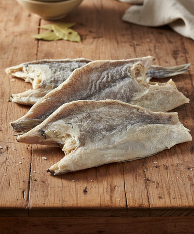 Dried fish on a white tray with 'Product of Canada' label
