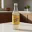 Bottle of Solo Ginger Beer on a white background