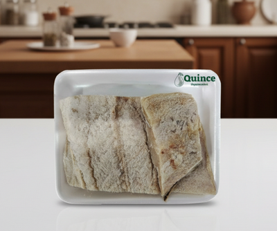 Two pieces of bread in a white container with 'Quince Supermarket' logo.
