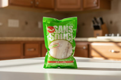 Green package of Sains Soili with a picture of white fish on a white background