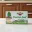 Shavuot Soursop Leaf Herbal Tea packaging with green leaves and tea bag illustration on a white background.