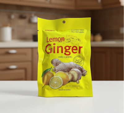 Yellow package of lemon ginger hard candies with ginger and lemon illustrations on a white background.