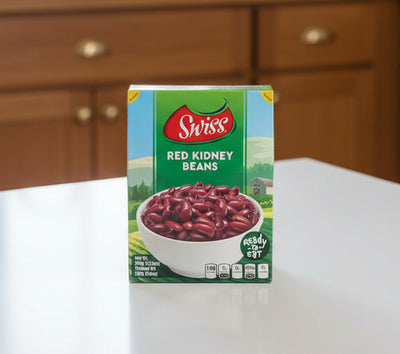 Box of Swiss Red Kidney Beans with a bowl of beans on a scenic background