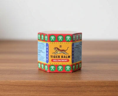 Stack of Tiger Balm red boxes