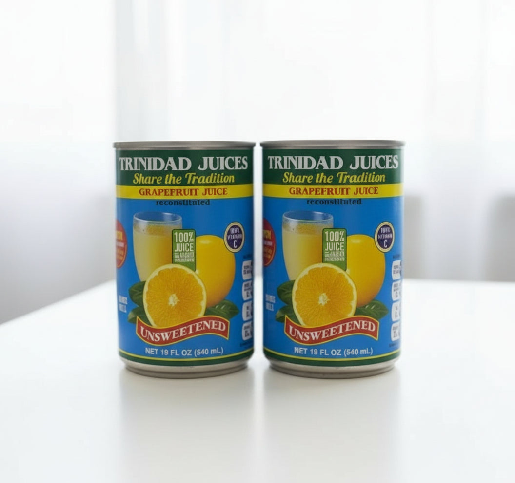 Can of Trinidad Juices grapefruit juice on a white surface with a white background