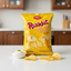 Yellow package of Yupi Rizadas Potato Chips Mayonnaise Flavored on a white background