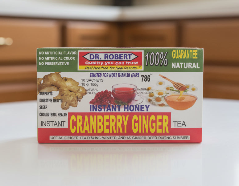 Box of Dr. Robert's Instant Cranberry Ginger Tea on a dark surface
